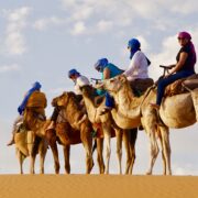 Trekking across the Sahara dunes near M’hamid El Ghizlan
